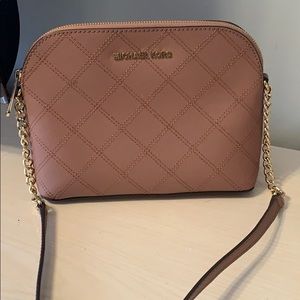 Mauve colored Michael Kors crossbody bag